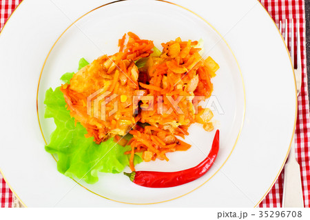 Fish in Greek with Onion and Carrot 35296708