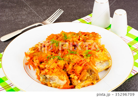 Fish in Greek with Onion and Carrot 35296709