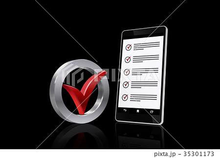 スマートフォンとチェックマーク 35301173