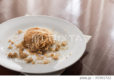 Plum dumplings on the white round plate Plum dumplings on the white round plate 35301722