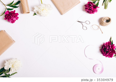 Festive composition of flowers and gifts Festive composition of flowers and gifts 35304979