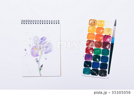 Notepad with drawing of a flower and watercolor Notepad with drawing of a flower and watercolor 35305056