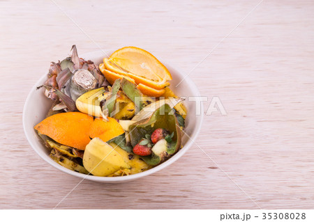 Bowl of household vegetable and fruits refuse 35308028