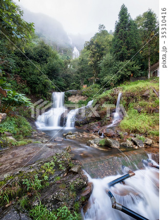 Silver waterfall or Thac Bac on fog in rainy Silver waterfall or Thac Bac on fog in rainy 35310416