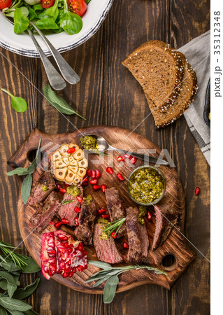 Meat steak with green pesto 35312348