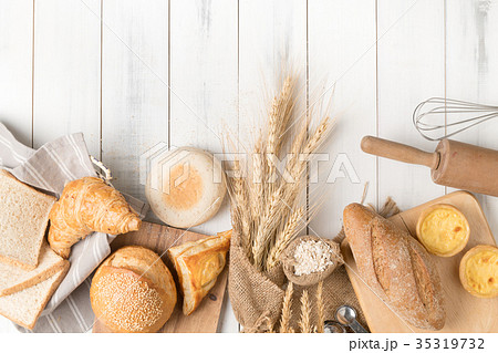 bread and bakery ingredients on white wooden bread and bakery ingredients on white wooden 35319732
