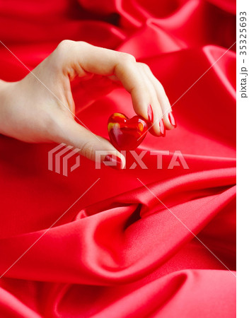 Decorative Heart in women's hands Decorative Heart in women's hands 35325693