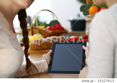 Close-up of four human hands are gesticulate over Close-up of four human hands are gesticulate over 35327613