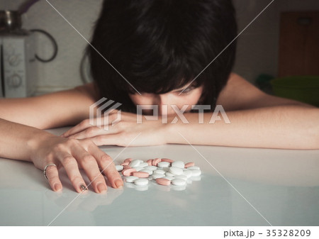 Woman with drugs. Addiction concept Woman with drugs. Addiction concept 35328209