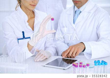 Team of scientific researchers in laborator Team of scientific researchers in laborator 35328342
