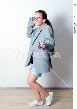 young funny girl with big suit young funny girl with big suit 35328871