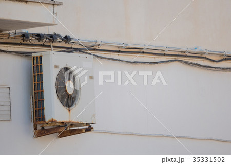 Old rusty air conditioning in Spain 35331502