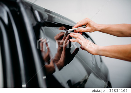 Specialist work with car, tinting film installing Specialist work with car, tinting film installing 35334165