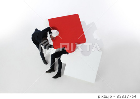Businessman saving colleague 35337754