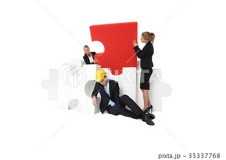 Coworkers look at tired foreman Coworkers look at tired foreman 35337768