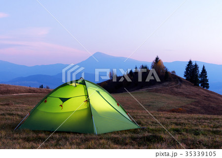 Green tent lighted from the inside Green tent lighted from the inside 35339105