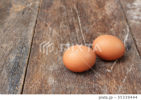 egg on wood background 35339444