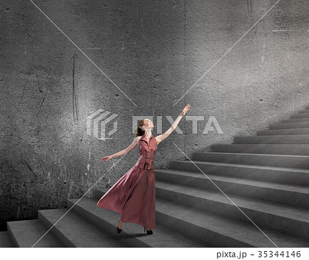 Woman running on stairs Woman running on stairs 35344146