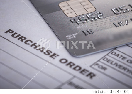 Credit card on purchase order in the office. For financial or business use 35345106