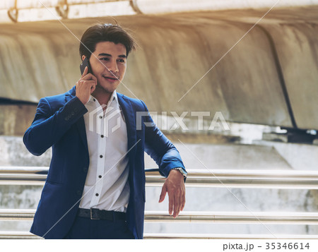 Business man using smartphone Business man using smartphone 35346614