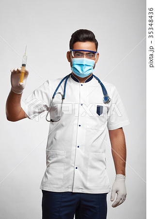 Male doctor posing at studio 35348436