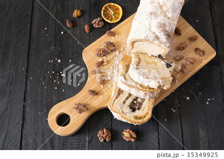 Dessert with poppy and nuts on trencher Dessert with poppy and nuts on trencher 35349925