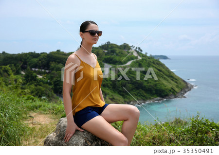 Young woman sitting and relaxing  35350491