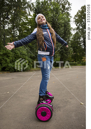 Child on hover board 35350508