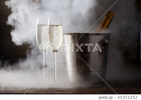 Festive image of two wine glasses with sparkling Festive image of two wine glasses with sparkling 35351252