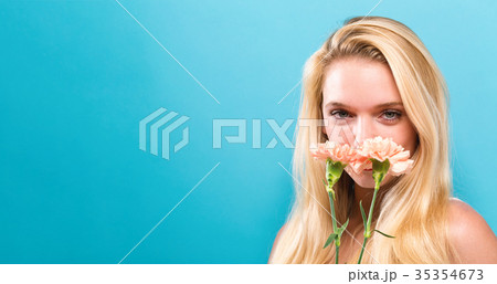 Young woman with carnation Young woman with carnation 35354673