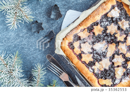 Sweet Christmas berry pie in Christmas decorations 35362553