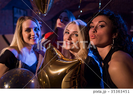 Pretty European girls smiling, blowing kisses Pretty European girls smiling, blowing kisses 35363451