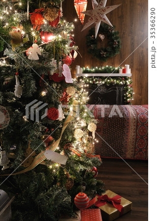 Christmas tree, bed and fireplace. 35366290