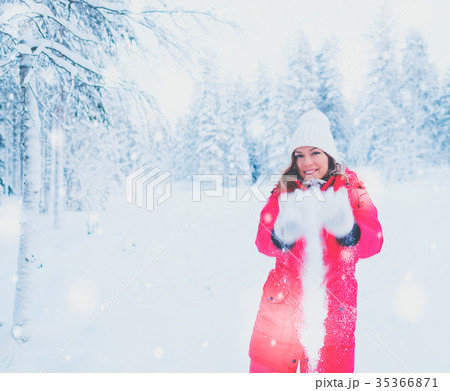Happy woman in a snow landscape 35366871