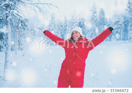 Happy woman in a snow landscape Happy woman in a snow landscape 35366872