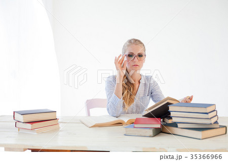 teacher in the Office preparing for the lesson teacher in the Office preparing for the lesson 35366966