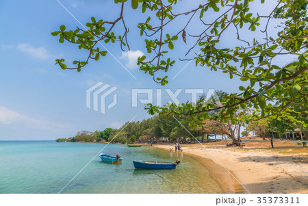 Clear view at beach with fisher boat 35373311