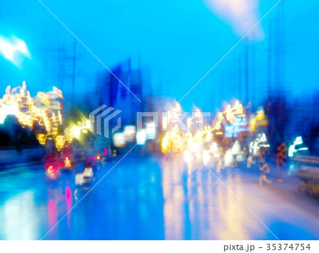 reflection of car light lamp on road in rainy day reflection of car light lamp on road in rainy day 35374754