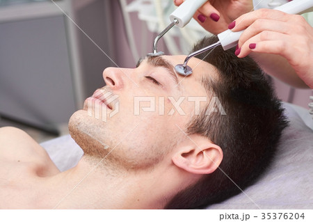 Close up of microcurrent therapy. Close up of microcurrent therapy. 35376204