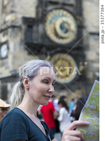 woman watches the map of the city on background of woman watches the map of the city on background of 35377364