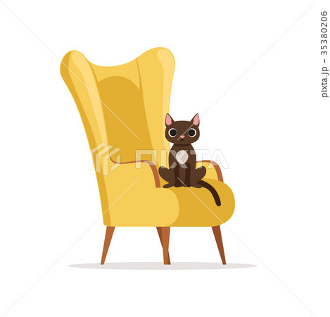 Cute funny cat sitting on a retro yellow armchair 35380206