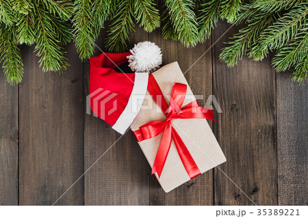 Christmas fir tree branches and gift box 35389221