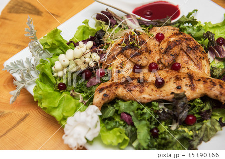 quail roasted with sweet and sour cranberry sauce quail roasted with sweet and sour cranberry sauce 35390366