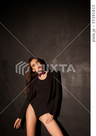 sexy girl in underwear and jacket is black wall 35391615