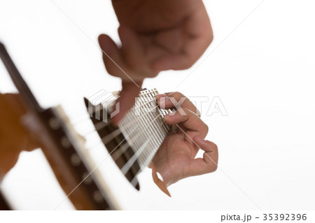 Man playing guitar 35392396