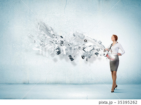 Businesswoman playing drums 35395262