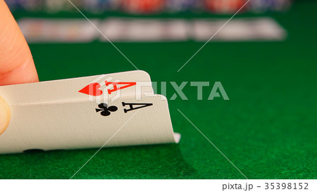POKER: Player opens and looks his cards in game 35398152