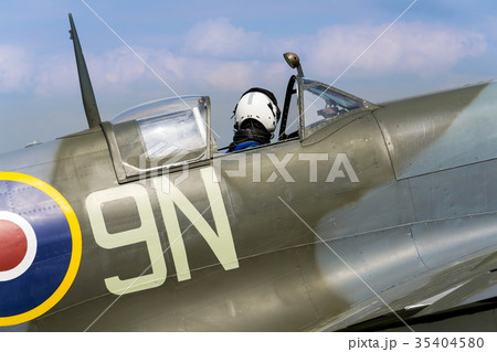 Pilot sits in cockpit of Supermarine Spitfire 35404580