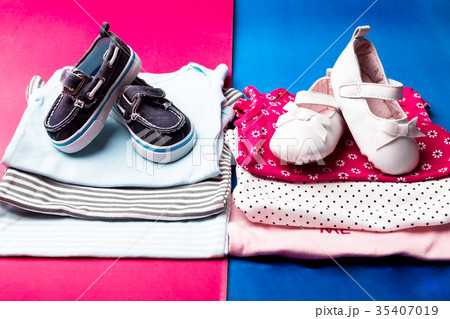 Folded blue and pink bodysuit with boat shoes on Folded blue and pink bodysuit with boat shoes on 35407019
