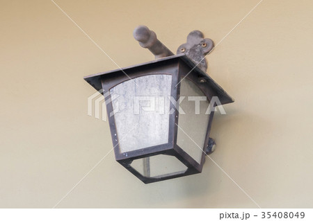 Vintage looking metal lantern with modern lamp Vintage looking metal lantern with modern lamp 35408049